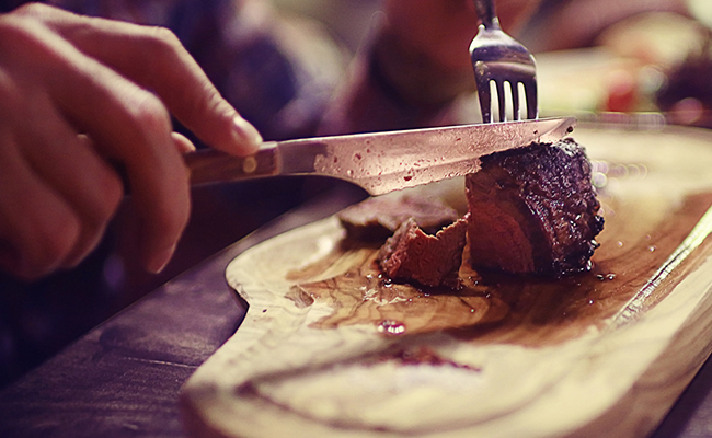 how to cut meat with fork and knife